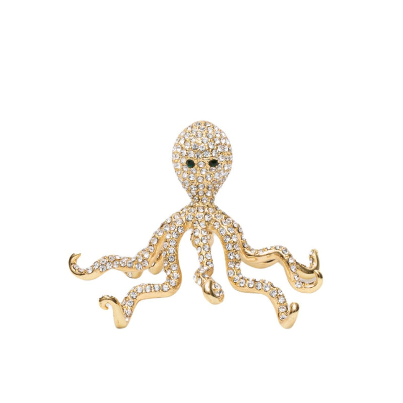 A gold-colored octopus-shaped place card holder with a sparkling surface.