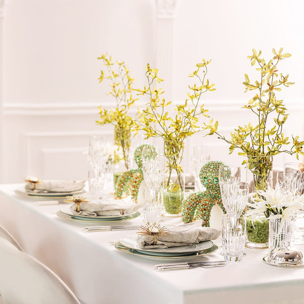 table decor featuring green bejewelled octopus in crystals on table with flowers