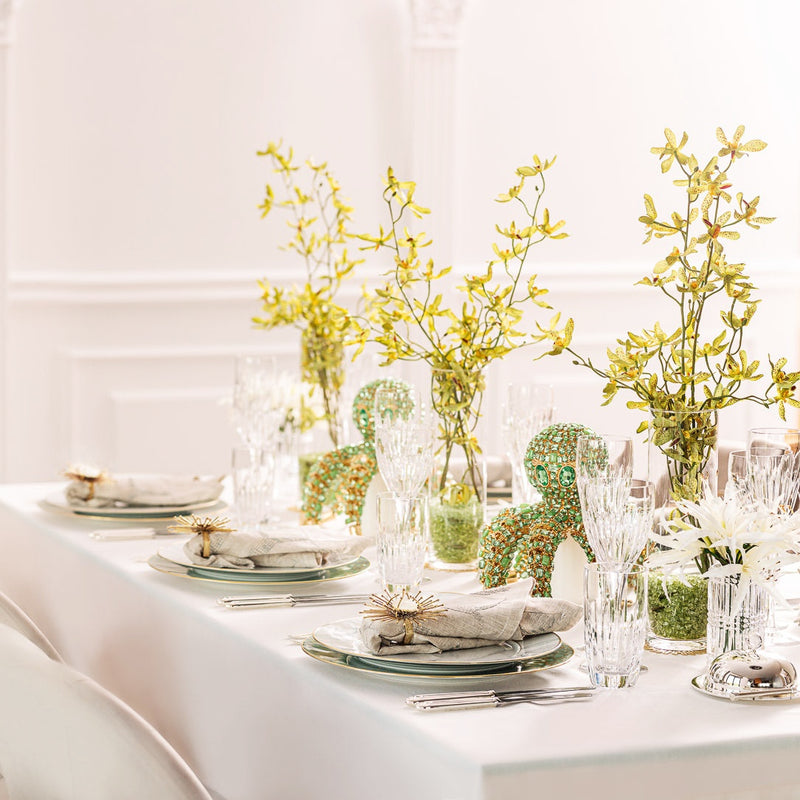 table decor featuring green bejewelled octopus in crystals on table with flowers