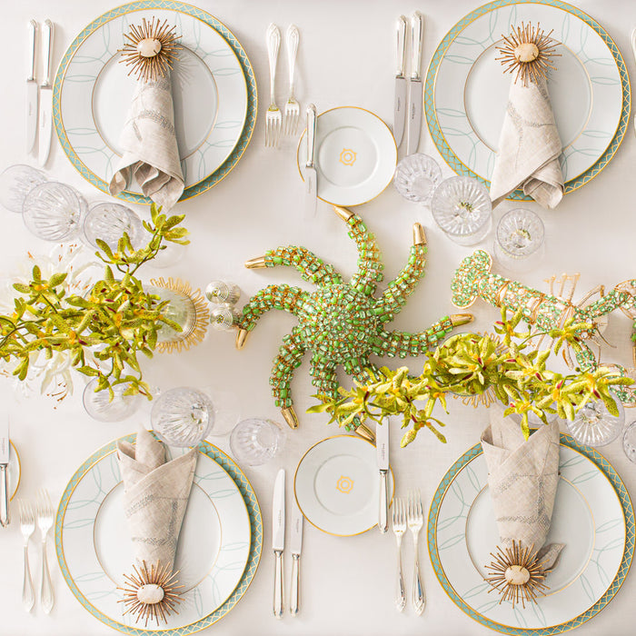 table decor featuring the green bejewelled octopus figurine as centrepiece on a table
