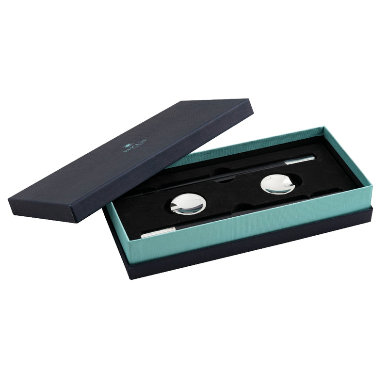 silver-plated chopstick set with ebony sticks and round holders by Ercuis