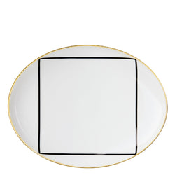 Porcelain oval coup shaped platter from my china ca d oro collection featuring black square motif and gold rim by sieger furstenberg