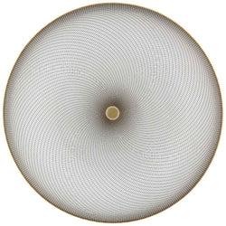 A white porcelain plate with geometric black and gold curves on a round surface.
