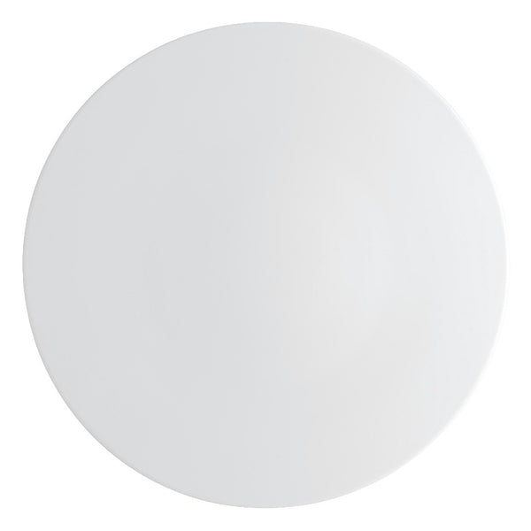 A white porcelain presentation plate with a simple, elegant design from the 'Uni' collection by Raynaud.