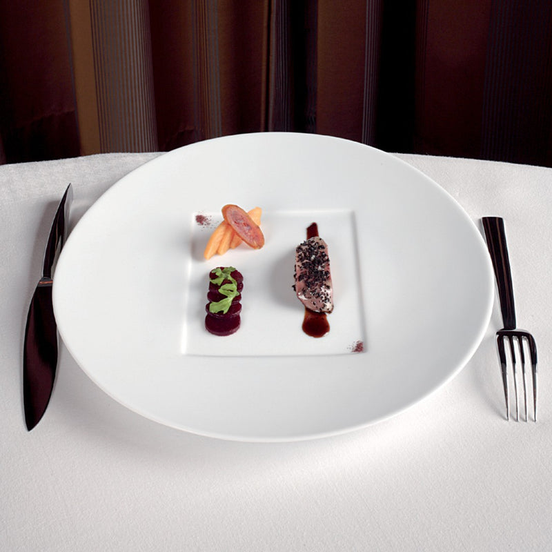 srtyled Hommage presentation square center plate by Raynaud, wide-rimmed fine porcelain handcrafted in France for elegant dining presentations.
