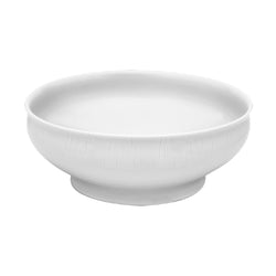 A white, round porcelain salad bowl with a textured edge.