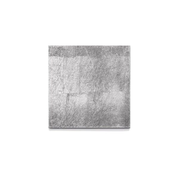 A square silver coaster with a textured surface, likely made of wood with a lacquer finish, from Posh Trading Company.