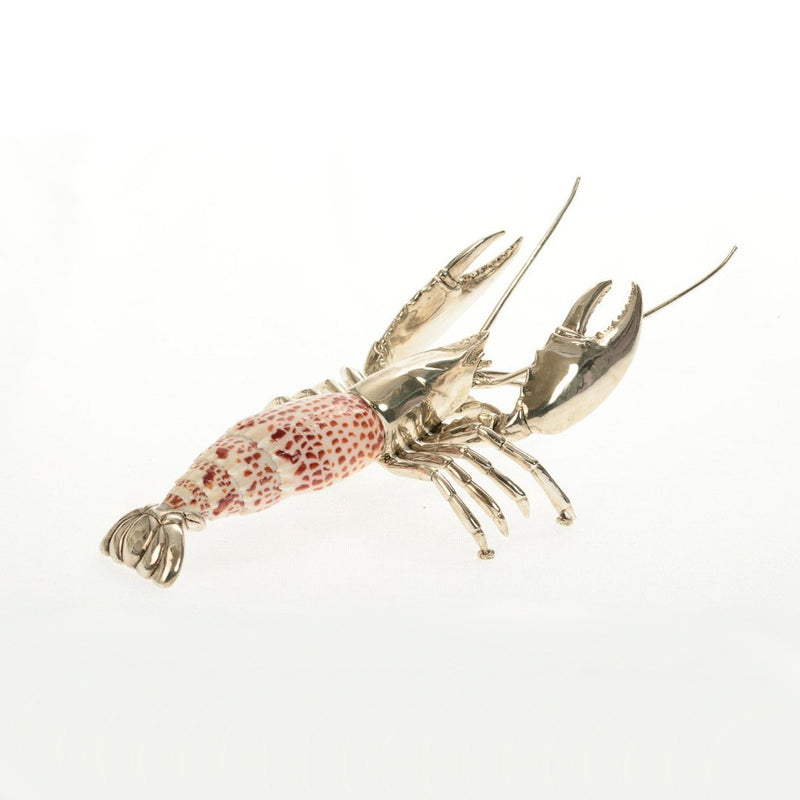 silver plated lobster figurine on white background