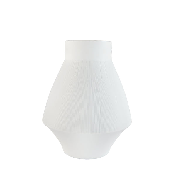 A white porcelain vase with a modern and timeless engraving, conical in shape with a flared top.