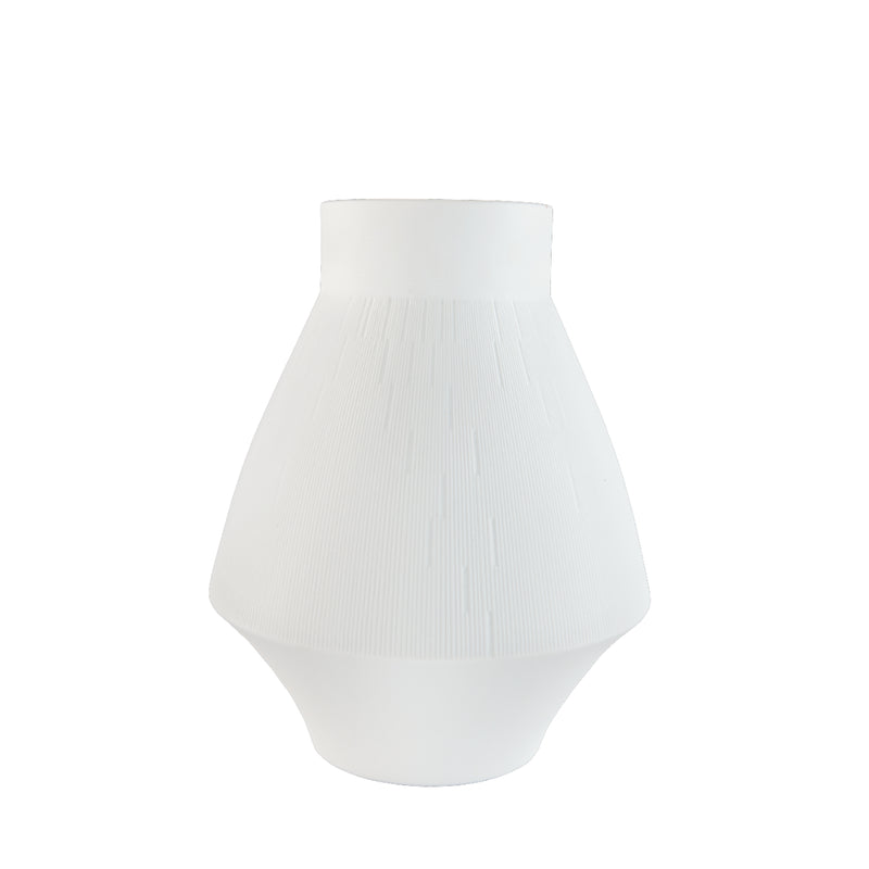 A white porcelain vase with a modern and timeless engraving, conical in shape with a flared top.
