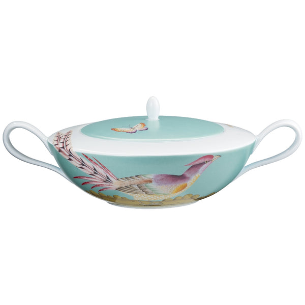soup tureen in turquoise featuring a bird patter on a white background