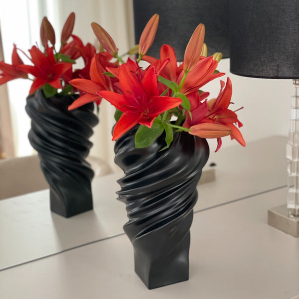 Squall 32cm black matte porcelain vase by Rosenthal with red Lilly flowers