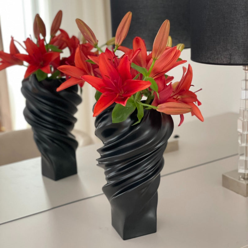 Squall 32cm black matte porcelain vase by Rosenthal with red Lilly flowers