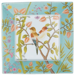 A square porcelain trinket tray with turquoise and white colors featuring birds and floral motifs on a pure white background.