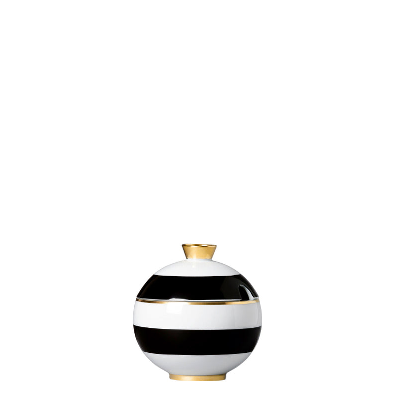 A cylindrical porcelain sugar bowl porcelain sugar bowl from my china ca d oro collection with black and white horizontal stripes spherical form and gold accents by sieger furstenberg