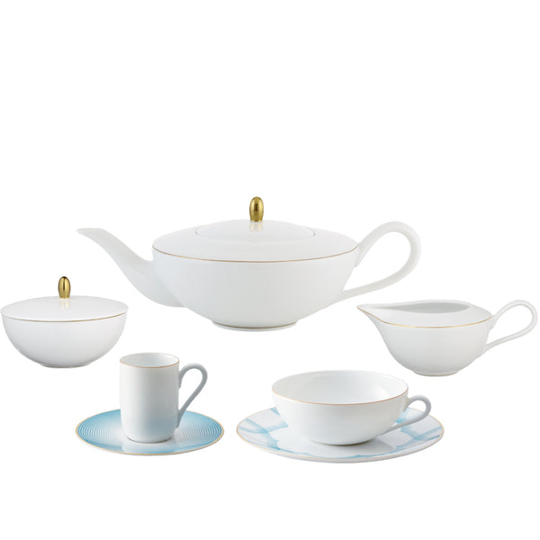 A 15-piece Raynaud porcelain dinnerware set in white, blue, and gold, including cups, saucers, a teapot, a sugar bowl, and a milk jug.