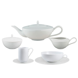 Uni Collection of porcelain showing a tea pot, sugar pot, espresso cup and saucer, tea cup and saucer and a milk jug.