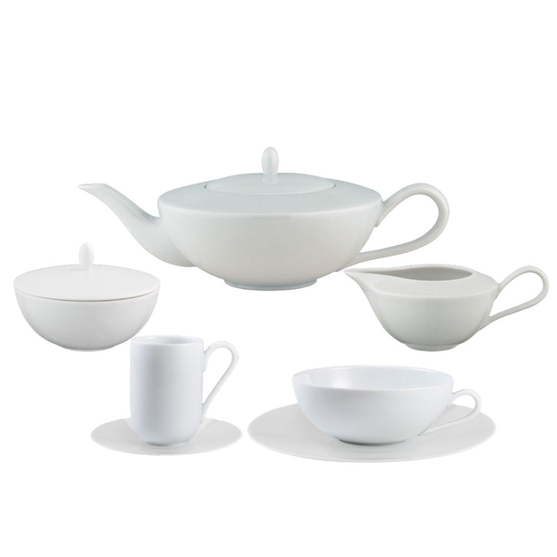 Uni Collection of porcelain showing a tea pot, sugar pot, espresso cup and saucer, tea cup and saucer and a milk jug.