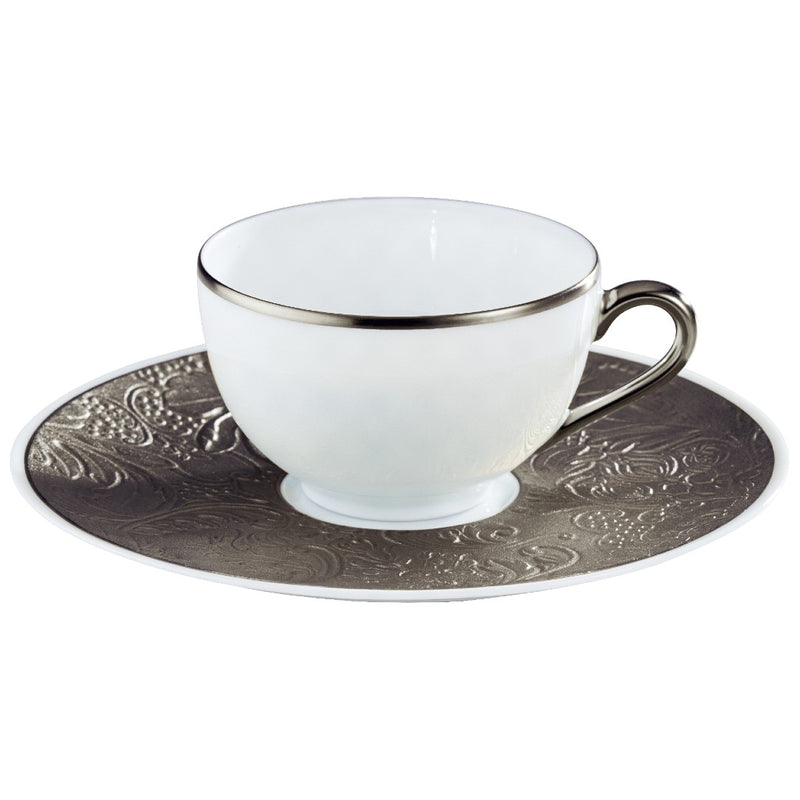 Porcelain tea cup 20cl with platinum rim and handle, paired with an intricately decorated saucer from the Italian Renaissance Platinum collection by Raynaud.