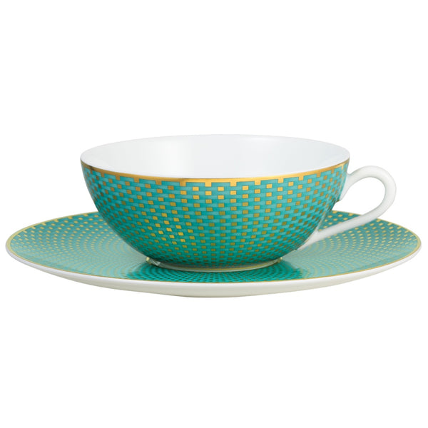 Raynaud Trésor turquoise porcelain tea cup and saucer with gold-accented honeycomb design
