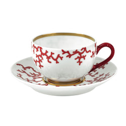 Luxury porcelain tea cup and saucer Cristobal Rouge red coral motif with gold accents by Raynaud
