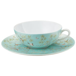 turquoise porcelain tea cup and saucer with small birds and leaves design