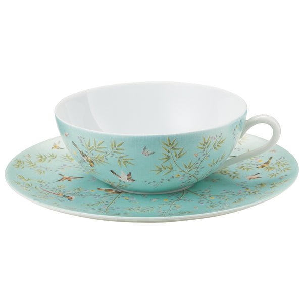turquoise porcelain tea cup and saucer with small birds and leaves design