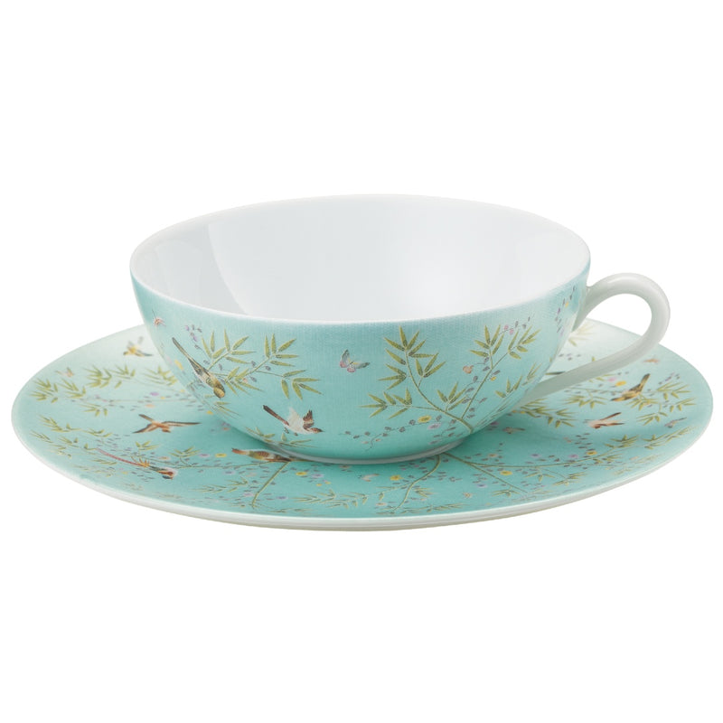 turquoise porcelain tea cup and saucer with small birds and leaves design