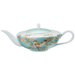 A turquoise and white Limoges porcelain tea pot with birds and floral patterns, featuring a lid and handle.