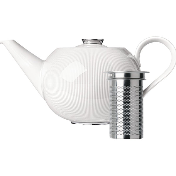 A white porcelain teapot with a platinum finish and a matching strainer, featuring intricate relief lines and a shiny star-like pattern.