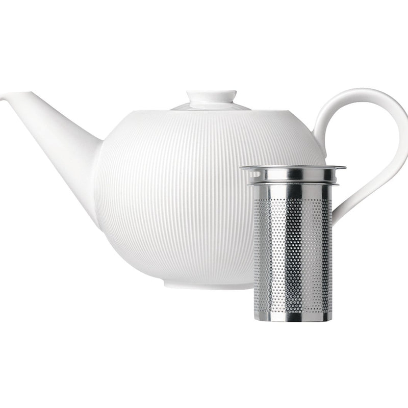 A white porcelain teapot with a silver tea strainer, featuring a relief pattern.