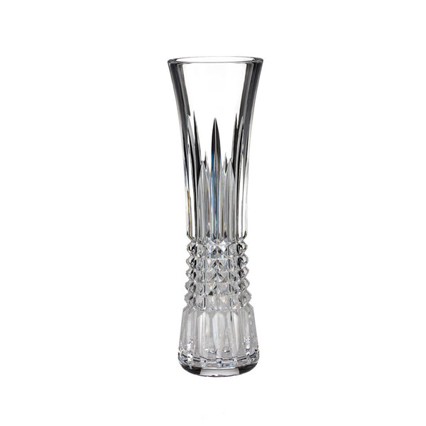 A clear crystal Lismore Diamond Bud Vase with intricate diamond cuts and a rounded top.