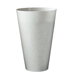 A white, round porcelain vase with a textured surface.