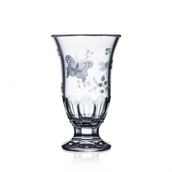 A clear, footed crystal vase with hand-engraved floral and insect motifs, part of the Springtime Collection.