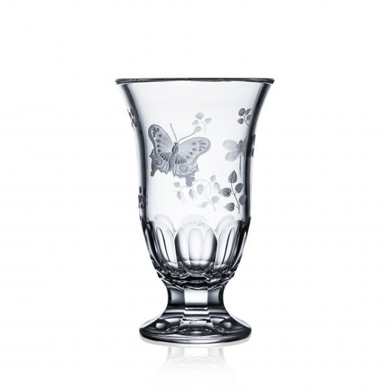 A clear, footed crystal vase with hand-engraved floral and insect motifs, part of the Springtime Collection.