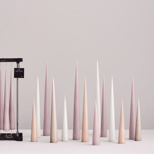 styled white and pinks cone candles