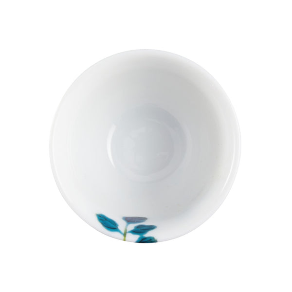 Inside view of the Harmonia luxury porcelain zarf or sake cup with fruit and floral motifs inspired by Chinese imperial art by Raynaud